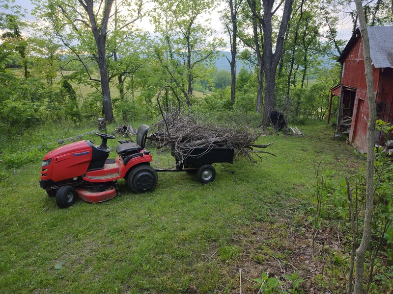 Brush clearing site work used as property development context.