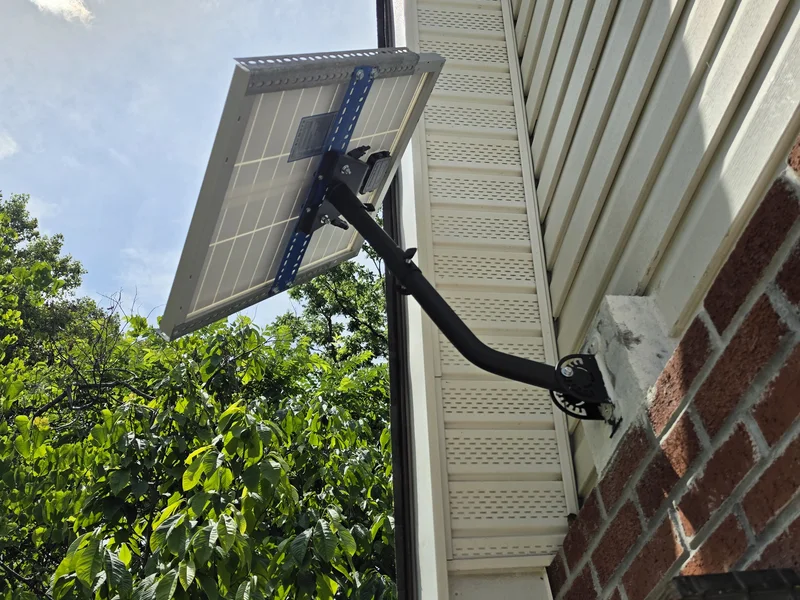Shed solar hardware staged for an outdoor power system update.